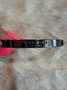 Coach Silver Tone Hinged Bangle Bracelet with Gold Accent Studs
